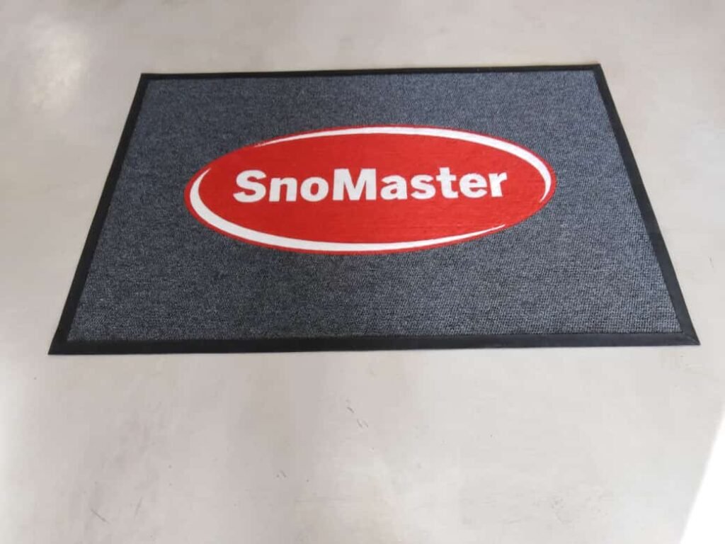 Durable rubber-backed logo mat