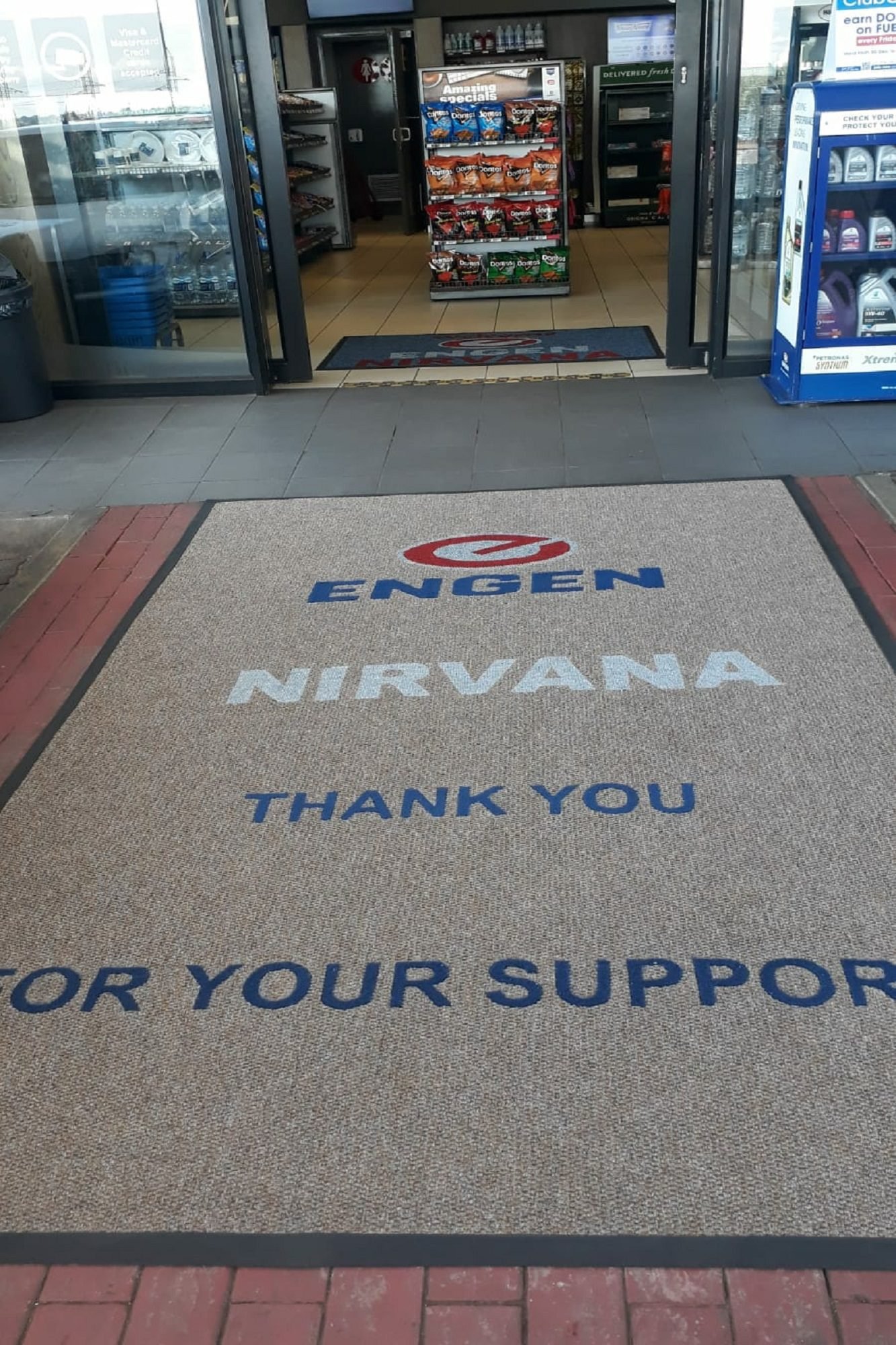 Office entrance mats with a custom promotional logo